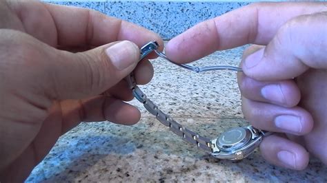 how to unclasp a rolex watch